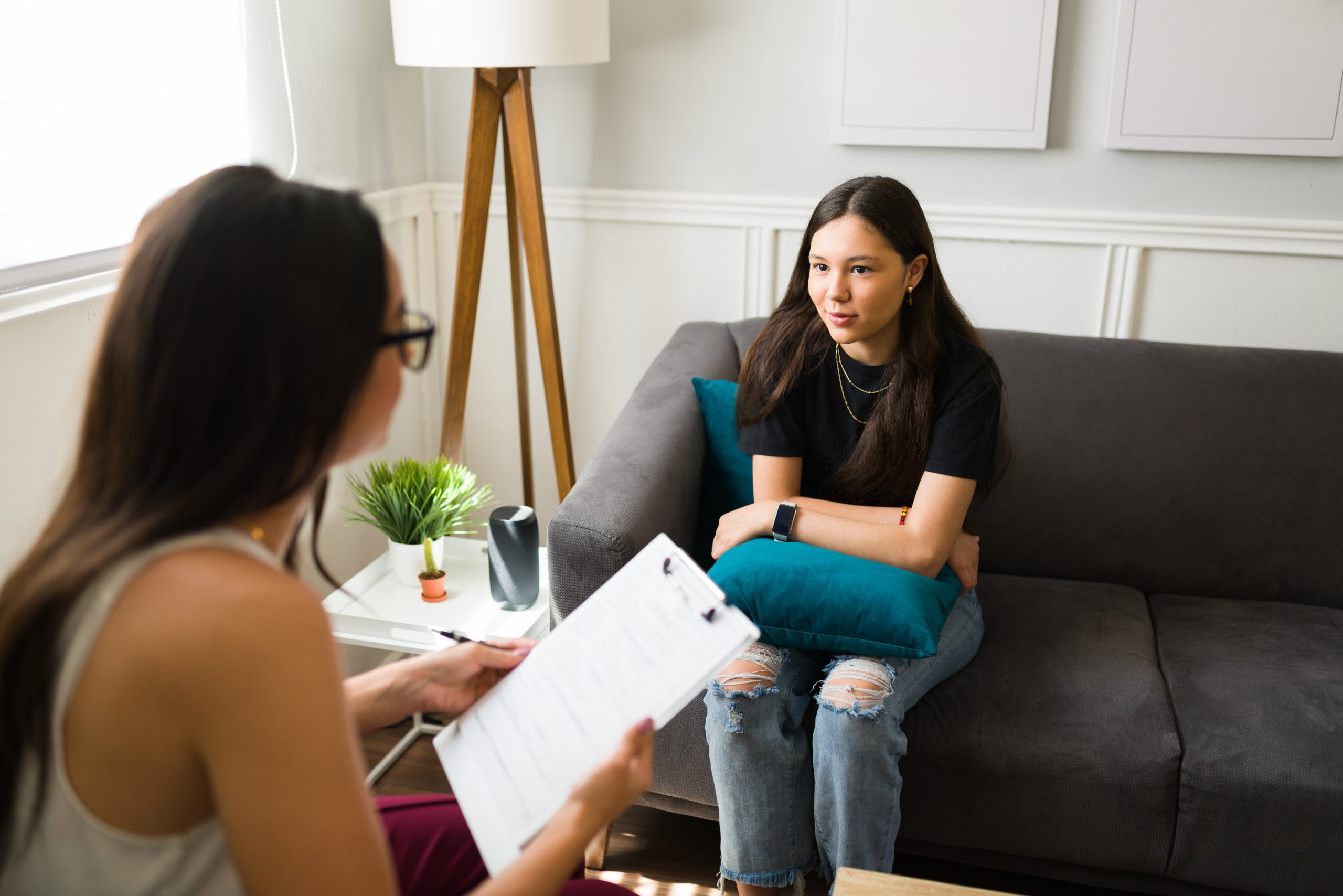 Teen girl talking to her therapist